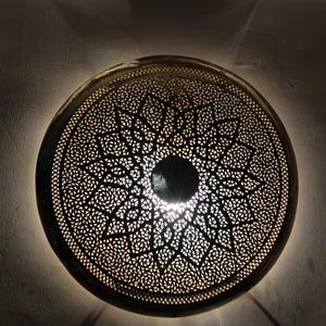 Moroccan Brass Circular Wall Sconce with Fine-Cut Rose Pattern - Elegant Light Fixture