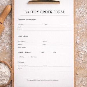 May include: A clipboard with a "BAKERY ORDER FORM" printed on white paper. The form includes sections for customer information, order details, pickup/delivery, and payment. The clipboard is on a wooden surface with flour and baking tools.