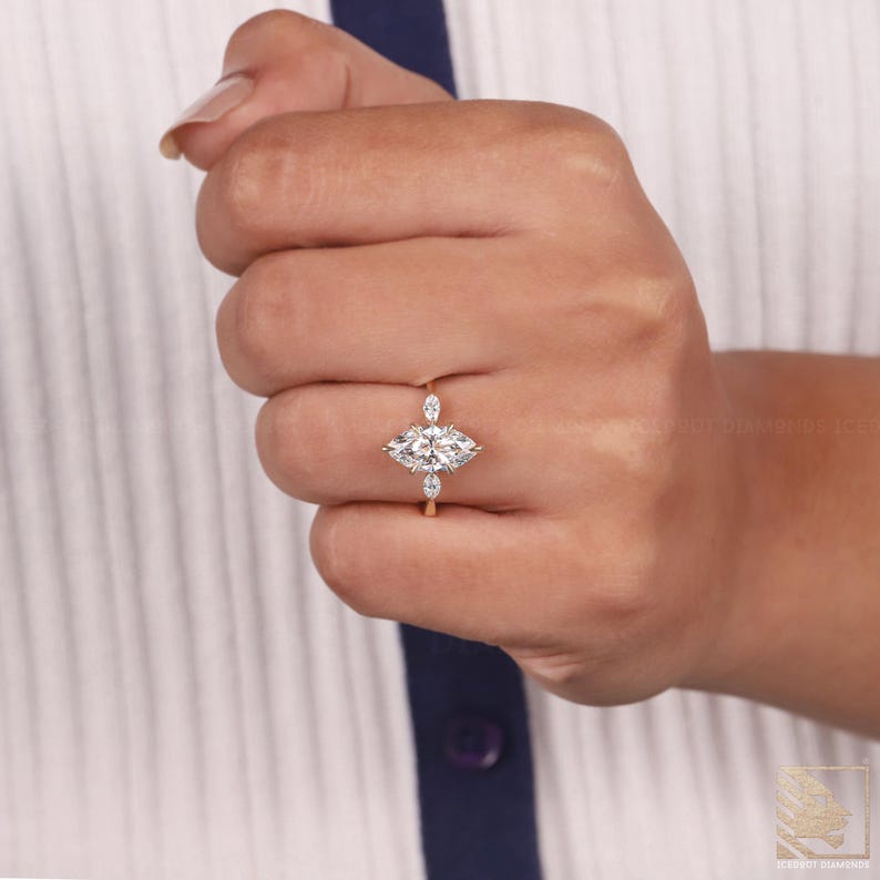side stone ring,three stone ring,vintage ring,yellow gold ring, bridal ring,elegant ring,engagement ring,gold moissanite,marquise cut,marquise ring,moissanite ring,pear accent ring,promise ring,side stone ring,three stone ring,vintage ring,yellow gold ring, 3 stone ring,engagement gift,gift for women,marquise cut ring,marquise ring,marquise shape ring,marquise three stone,moissanite ring,pear cut ring,solitaire ring,three stone ring,trilogy ring,wedding ring
