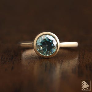 Solitaire Moissanite Engagement Ring 1.25CT Old European Cut Round Moissanite Ring Cyan Blue Moissanite Wedding Ring Bezel Set Proposal Ring