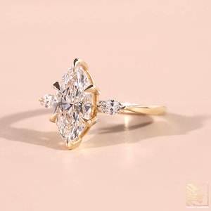 Marquise Cut 2.3 carat IGI Certified D Color VVS2 Clarity Lab Grown Diamond Three Stone Engagement Ring Handmade of 14k Gold
Lab Grown Diamond Three Stone Ring, 1 to 3 CT Marquise Cut Diamond Engagement Ring, Side Kite Cut Diamond, Anniversary Gift, Ring for Women
Yellow Gold Ring
Certified Lab Grown
F Color Marquise
3.50 CT Marquise Cut Three Stone Engagement Ring, 14K/18K Solid Yellow Gold, Side Stone Pear Cut Diamonds, Promise Wedding Ring Gift For Her
3 Stone Ring
Wedding Ring