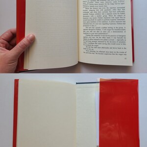 Puede incluir: Un libro abierto con una cubierta roja y p&aacute;ginas blancas. El libro se titula "Cap&iacute;tulo V". El texto de la p&aacute;gina habla de un hombre llamado Frabano que es un hipnotizador. El texto describe una apuesta hecha entre Frabano y un reportero.