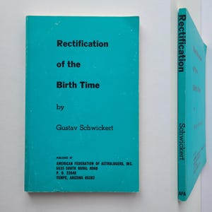 May include: Two books with teal covers. The front cover of the first book reads "Rectification of the Birth Time" by Gustav Schwickert. The spine of the second book reads "Rectification of the Birth Time" and "Schwickert". The books are for sale.