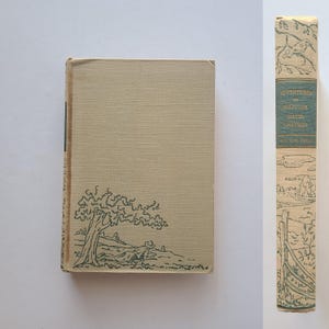 May include: A vintage hardcover book titled "Adventures in Solitude" by David Grayson. The book cover features a green line drawing of a person sitting under a tree in a field.