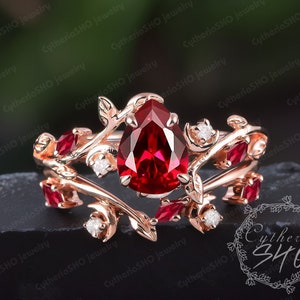 Vintage pear shaped ruby engagement ring set Art deco leaf promise ring Unique nature inspired rose gold bridal set Handmade jewelry gift