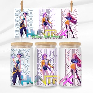 May include: Clear glass tumblers with wooden lids and straws, each displaying a character design and the names "Zoey", "Rumi", and "Mira". The designs are in bright colours. A matching card is suspended above the tumblers.