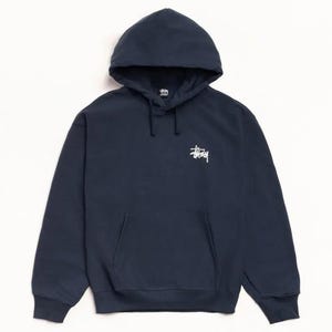 May include: Navy blue hooded sweatshirt with a front kangaroo pocket and white logo on the chest. The sweatshirt has a drawstring hood and ribbed cuffs and hem. A casual, comfortable garment.
