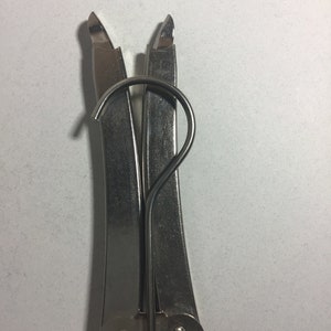 Clothing hanger folding .