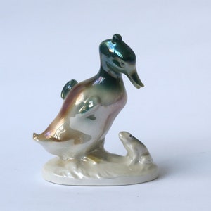 Porcelain figurine porcelain bird Duckling with a frog Carl Scheidig Germany