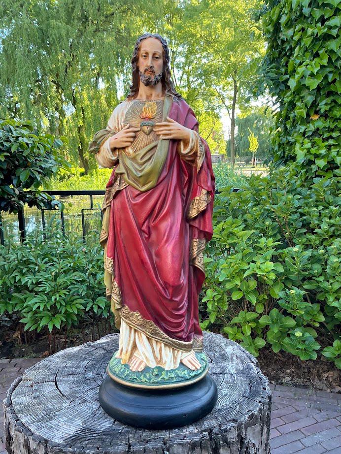 Beautiful antique statue of Jesus sacred heart