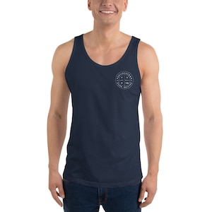 May include: A navy blue tank top with a white circle logo that says "Provincetown, Dune Driving, P.D. Est. 2010".