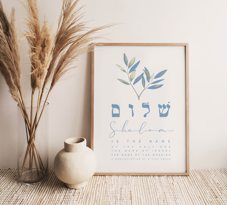 May include: A printable wall art design featuring the Hebrew word "Shalom" in blue lettering with an olive branch illustration. The text below reads "Is the name of the Holy One, the name of Israel, the name of the Messiah, a manifestation of divine grace."