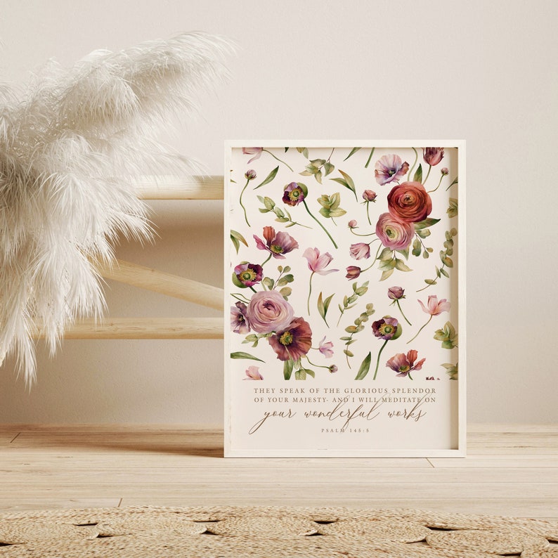 May include: A white framed print with a watercolor floral design and a bible verse from Psalm 145:5. The verse reads "They speak of the glorious splendor of your majesty, and I will meditate on your wonderful works."