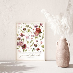 May include: A framed print with a white background and a floral pattern in shades of pink and red. The print includes the text "They speak of the glorious splendor of your majesty, and I will meditate on your wonderful works. Psalm 145:5".