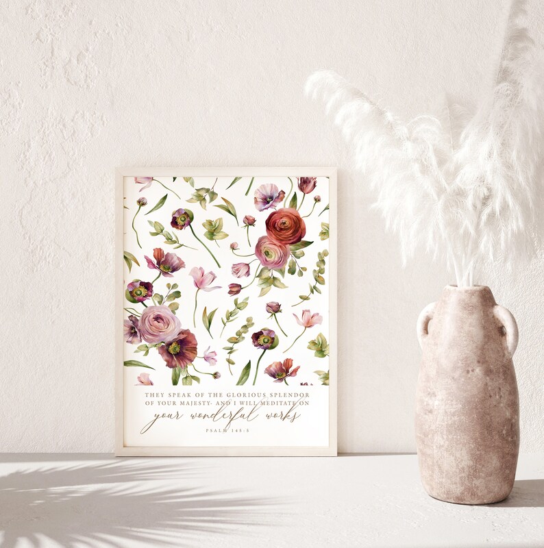 May include: A framed print with a white background and a floral pattern in shades of pink and red. The print includes the text "They speak of the glorious splendor of your majesty, and I will meditate on your wonderful works. Psalm 145:5".
