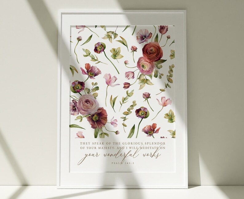May include: A watercolor print with a floral design in shades of pink, red, and green. The print features the text "THEY SPEAK OF THE GLORIOUS SPLENDOR OF YOUR MAJESTY AND I WILL MEDITATE ON YOUR WONDERFUL WORKS" and the words "PSALM 145:5".