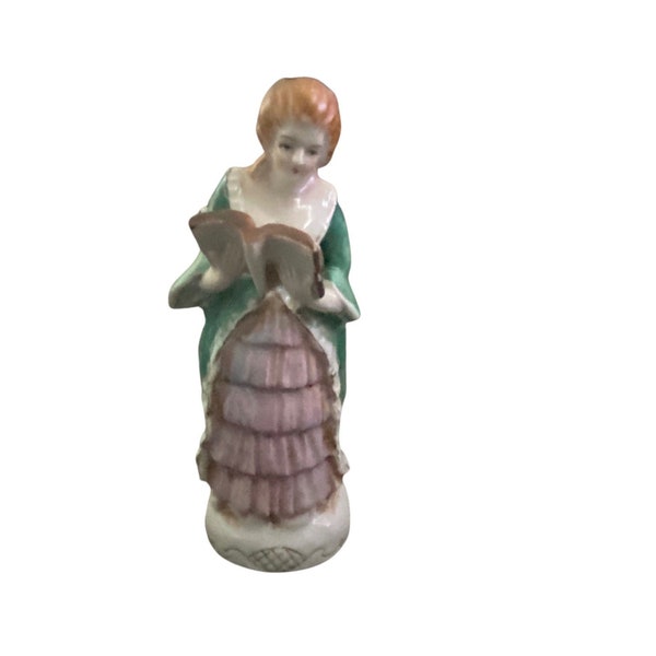 Vintage Occupied Japan figurine of lady in green and purple dress