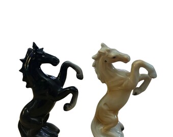 Vintage unmarked beige and black horse salt and pepper shakers