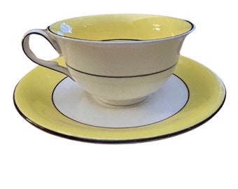 Tasse à thé et soucoupe jaune et blanche Crown Ducal, 1921