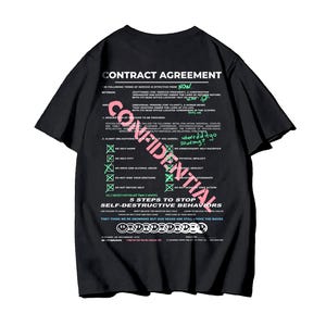 May include: A black short-sleeve t-shirt featuring a large white graphic on the back that resembles a contract agreement. The design includes the word CONFIDENTIAL in large pink letters, green checkmarks, and various text lines about self-care.