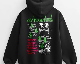 May include: A black hooded sweatshirt featuring a back graphic with the word exhausted in green, alongside various white and green hand-drawn style illustrations, dollar signs, and text including nobody really cares if you dont go to the party.