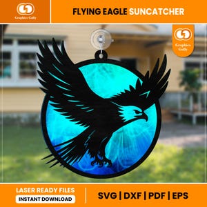 May include: A black silhouette of a flying eagle against a blue and turquoise background. The eagle is in a circular shape, perfect for a suncatcher.