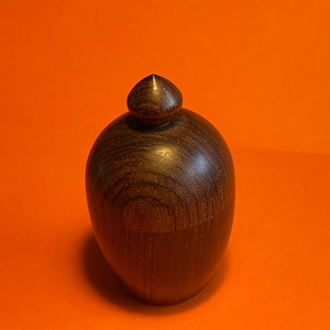 Beautifully hand crafted,  dry tactile turned wooden lidded pot probably teak