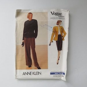 May include: A set of three ceramic mugs with a speckled, matte finish. The mugs are in shades of cream, light gray, and dark gray. Each mug has a simple, minimalist design, perfect for coffee or tea.