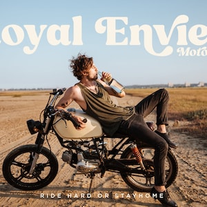May include: A person sitting on a vintage motorcycle in a desert landscape. The motorcycle is beige with black wheels and the text "Royal Enfield Motorcycle" is written in white on a beige background. The text "Ride Hard or Stay Home" is written in white on a beige background below the motorcycle.
