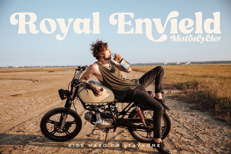 May include: A person sitting on a vintage motorcycle in a desert landscape. The motorcycle is beige with black wheels and the text "Royal Enfield Motorcycle" is written in white on a beige background. The text "Ride Hard or Stay Home" is written in white on a beige background below the motorcycle.