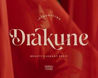 Op de afbeelding: Rode achtergrond met het woord "Drakune" in een schreeflettertype. De tekst "Introducing" staat boven het hoofdwoord en "Beauty Elegant Serif" staat eronder. Het Shákira Studio-logo staat onderaan.