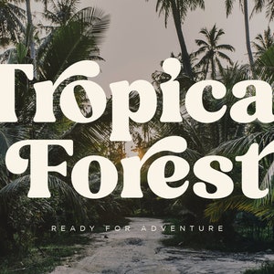 May include: A white text graphic on a background of lush green palm trees reads "Tropical Forest" with the tagline "Ready for Adventure".