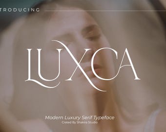 May include: The image displays the word "LUXCA" in a modern serif font, set against a blurred background of a person's face. The text "Introducing" and "Modern Luxury Serif Typeface" are also present.