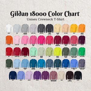 May include: A color chart for Gildan 18000 Unisex Crewneck T-shirts. The chart displays a wide array of colors, including white, black, orange, and various shades of blue, green, and purple. The text "Gildan 18000 Color Chart" is at the top.