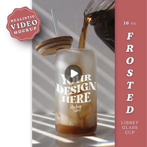 May include: A frosted glass cup with a straw and a lid, being filled with a dark liquid. The cup has the text "Your Design Here" printed on it. The cup is 16 oz and is made by Libbey.
