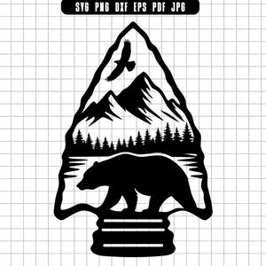 May include: Black and white graphic of an arrowhead design featuring a bear, mountains, trees, and a flying bird. The design is suitable for outdoor and nature-themed products.