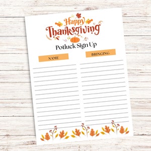 May include: Thanksgiving potluck sign-up sheet with the words "Happy Thanksgiving" in orange and red. The sheet has sections for name and what to bring, with decorative fall leaves and pumpkins.