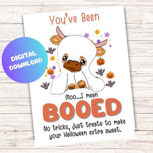 May include: A Halloween digital download card with a cartoon cow in a ghost costume. The card reads "You've Been BOOED" in orange, with text about treats. The design includes purple stars, bats, and pumpkins, perfect for the spooky season.