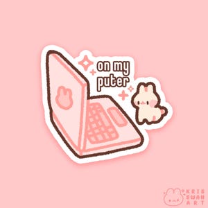 May include: A pink sticker featuring a laptop with a bunny logo and a small bunny character. The text "on my puter" is above the laptop. The sticker has a white border and is on a pink background.