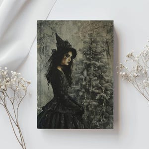 May include: A gothic-themed print featuring a woman in a black dress and witch hat, standing near a Christmas tree. The artwork has a vintage, grayscale aesthetic with intricate details and a mysterious atmosphere.