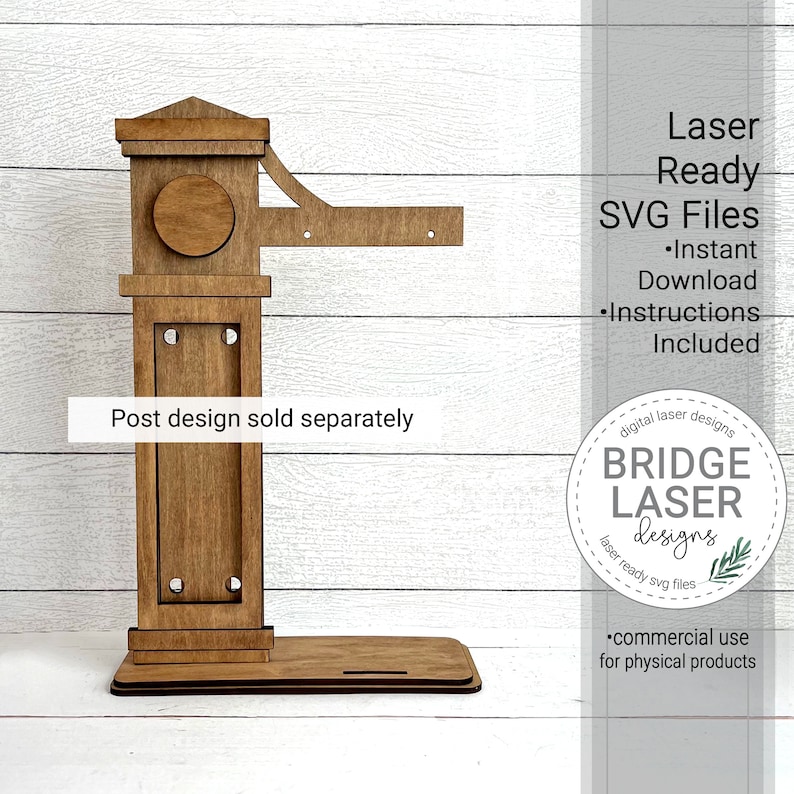 May include: A wooden sign post stand with a decorative top and a rectangular sign holder. The stand is made of laser-cut wood and is ready to be assembled. The sign post stand is designed for commercial use for physical products. The text "Laser Ready SVG Files" is visible in the image. The text "Instant Download" is visible in the image. The text "Instructions Included" is visible in the image. The text "Post design sold separately" is visible in the image. The text "digital laser designs" is visible in the image. The text "BRIDGE LASER designs" is visible in the image. The text "laser ready svg files" is visible in the image. The text "commercial use for physical products" is visible in the image.