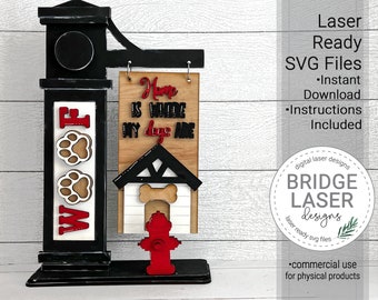 May include: A black and white wooden sign with the text "Home is where my dogs are" and a red fire hydrant. The sign is attached to a black wooden post with a paw print design. The sign is laser cut and ready to be assembled.