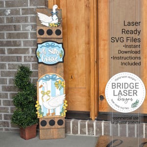 May include: A wooden goose-themed welcome sign with three sections. The top section features a goose, the middle says "Hi Silly Goose", and the bottom has a goose design. The sign is decorated with blue bows and yellow flowers. Laser ready SVG files are available.