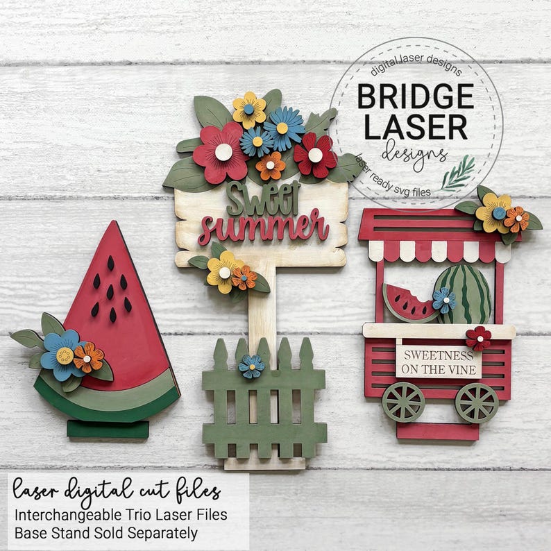 May include: Wooden summer decorations featuring a watermelon slice, a sign reading "Sweet Summer", and a watermelon stand. The decorations are embellished with colourful paper flowers and the text "Sweetness on the Vine".