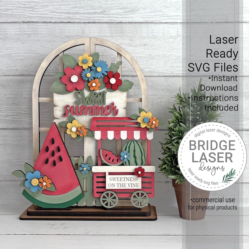 May include: A wooden summer decoration with a watermelon slice, a cart with a watermelon, and the words "Sweet Summer." The decoration includes colorful flowers and the text "Sweetness on the Vine."