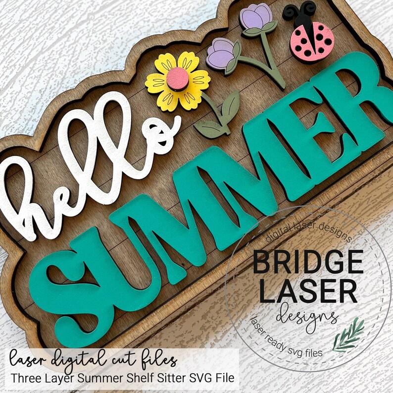 May include: A three-layer wooden shelf sitter with the words "hello summer" in white and teal lettering. The shelf sitter is decorated with flowers and a ladybug.