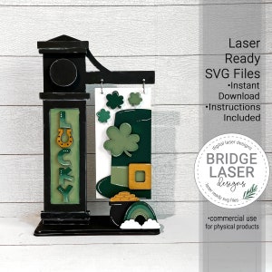 May include: Laser cut SVG file design for a St. Patrick's Day sign with a black post, a green shamrock, a leprechaun hat, a pot of gold, and the word "LUCKY" on the post. The design is for commercial use for physical products.