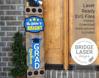 May include: A wooden sign with a blue and yellow graduation theme. The sign says "The future is bright" and "Congrats Grad". The sign is decorated with a graduation cap, stars, and a graduation tassel. The sign is laser cut and ready to be assembled.