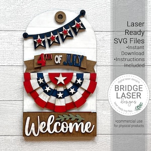 May include: A laser cut wooden sign with a 4th of July theme. The sign features a red, white, and blue banner, a star-shaped fan, and the words "4th of July" and "Welcome".