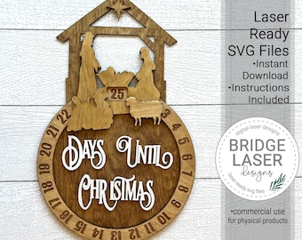 May include: Wooden Christmas countdown sign with a nativity scene silhouette and the words "Days Until Christmas." The sign has a circular design with numbers around the edge and the number 25 displayed. The sign also includes the text "Laser Ready SVG Files."